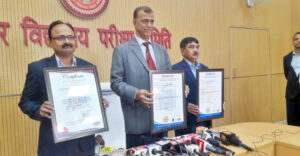 Bihar Board Chairman Anand Kishor with the award