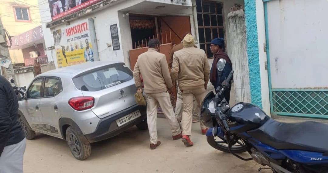 The house where the retired woman teacher was murdered.