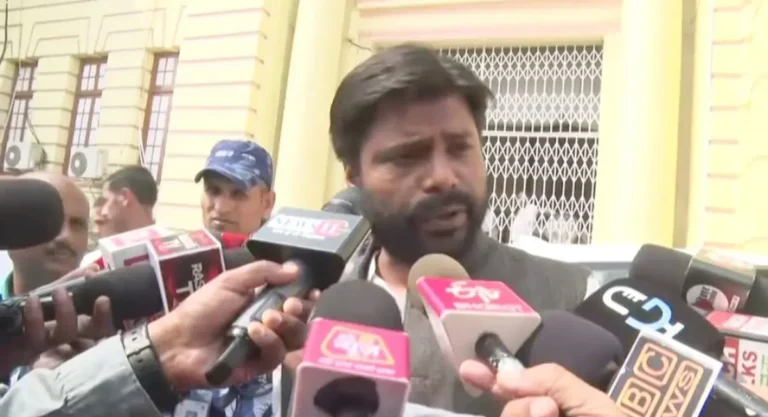 An Opposition member of Bihar Assembly talks to media