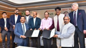 Dignitaries from JK Srivastava Hynfra Group and SRM University-AP leadership with the signed MoU