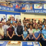 (Front Row)- Mr. Rajiv Bhatia, Secretary, NRAI (2nd from left), Manu Bhaker, double olympic medalist (3rd from left) & Mr. Pawankumar Singh, Secretary General, NRAI (4th from left) along with national squad and nationa centre of excellence shooters, support staff and NRAI officials, at the ceremonial cake-cutting on the occasion of the 75th Foundation Day of the NRAI at the Dr. Karni Singh Range on Friday (Apr 17, 2026)