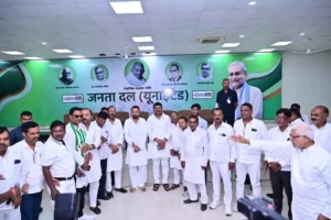 Nishant Kumar with party workers at JD(U) office in Patna.