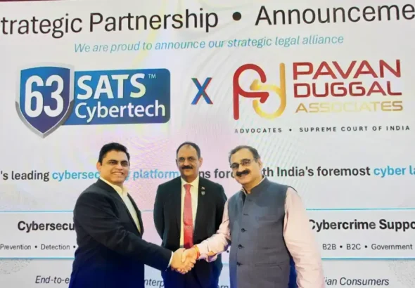 63SATS Cybertech MD & CEO Neehar Pathare joins hands with Dr. Pawan Duggal for a strategic alliance in front of 63SATS Chairman Lt. Gen M U Nair during CyberSec Expo in Mumbai