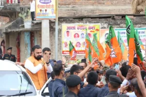 Supporters greet CM Samrat Choudhary during his Munger visit on April 26, 2026. 