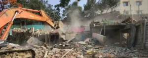 Illegal structures being demolished near Ganga River front in Patna.
