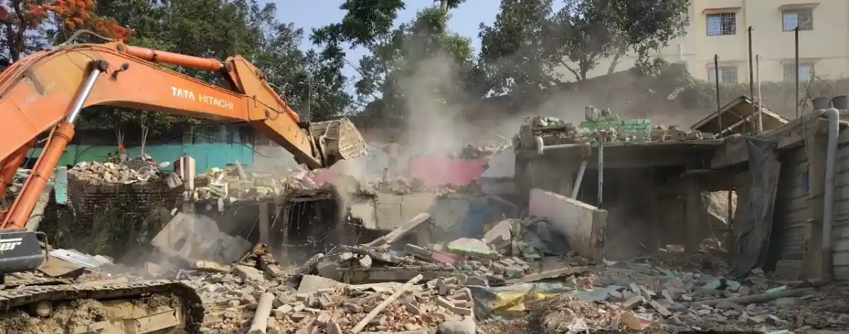 Illegal structures being demolished near Ganga River front in Patna.