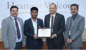 Chandigarh University Vice Chancellor & other Officials felicitating Sarvesh Gupta for topping IIT JAM 2026 (Physics) Exam with All India Rank 1