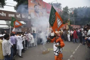 Bihar BJP workers celebrates party's victory in Assembly elections at state headquarters in Patna. 