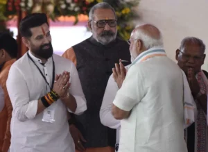 LJP(R) chief Chirag Paswan greets Prime Minister Narendra Modi during oath taking ceremony of Bihar ministers in Patna.