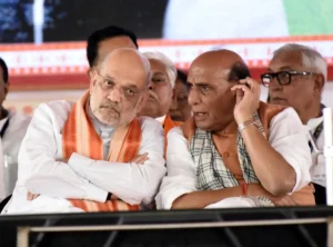 Union Home Minister Amith Shah and Defence Minister Rajnath Singh during the oath taking ceremony of new Bihar ministers at Gandhi Maidan in Patna.