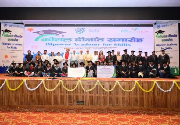 Dignitaries with graduating students at the iMpower Academy for Skills convocation in Panipat