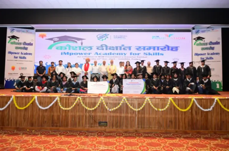 Dignitaries with graduating students at the iMpower Academy for Skills convocation in Panipat