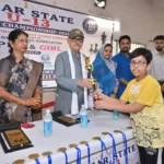Devansh Keshri receiving trophy from the chief guest in Katihar on May 31, 2026.