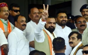 Bihar Chief Minister Samrat Choudhary shows victory sign as all nine NDA candidates file nominations for Bihar Legislative Council Elections in Patna on June 8, 2026.