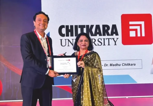 Vaibhav Srivastava, India Head–EdTechs & Education, Google Cloud, presents a plaque to Dr. Madhu Chitkara at the launch of Digital Campus on Google Cloud 4.0