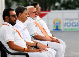 Prime Minister Narendra Modi along with West Bengal Chief Minister Suvendu Adhikari, West Bengal Governor RN Ravi in Kolkata on International Day of Yoga.