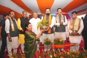 Chief Minister Samrat Choudhary presented a ceremonial kalash (sacred urn) to pilgrim Shobha Singh at Patliputra Junction on July 20, 2026.