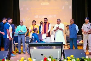 Bihar Chief Minister Samrat  Choudhary gives away appointment letter to a para athlete in Patna on July 24, 2026.